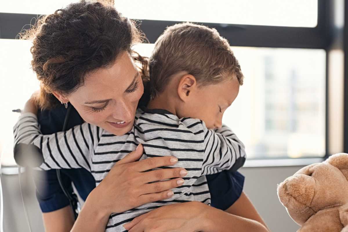 Mom comforting son